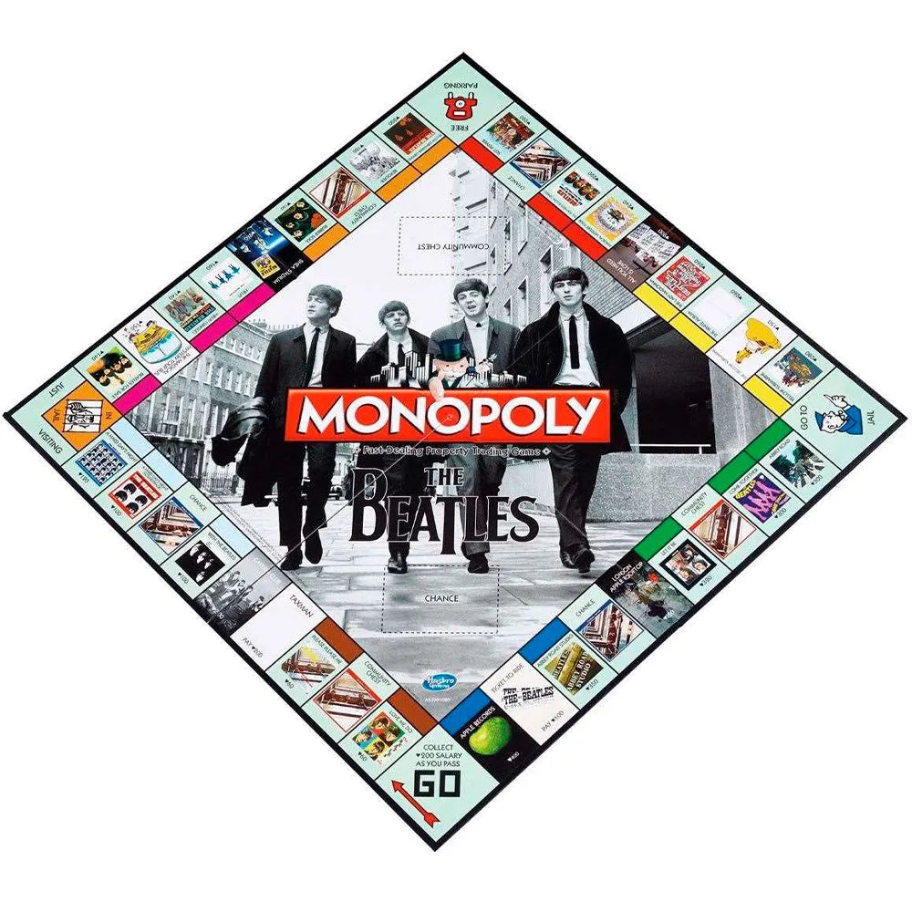 Monopoly The Beatles galda spēles laukums ar grupas dalībnieku fotogrāfiju un tematiskiem īpašumu lauciņiem.