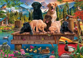 A family of dogs at the lake