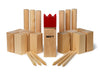 Bex Kubb World Cup komplekts no gaiša koka ar sarkanu ķēniņu, koka klucīšiem, metamajām nūjām un stūru mietiņiem.