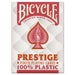 Izturīgas sarkanā krāsā Bicycle Prestige 100% plastikāta pokera kārtis ar klasisku Rider Back dizainu.