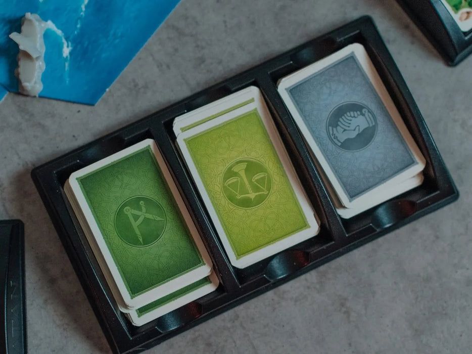Brain Games galda spēles Catan: Pilsētas un bruņinieki (2025, paplašinājums)