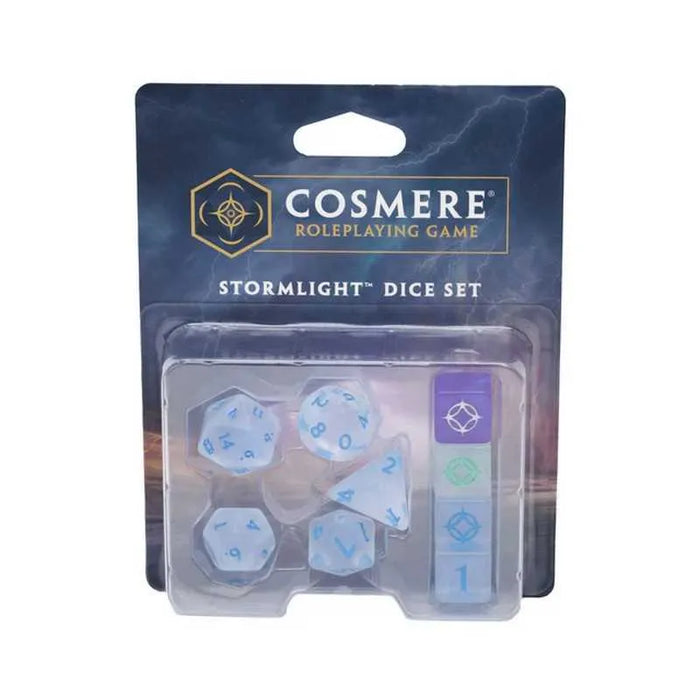 Cosmere RPG Stormlight kauliņu komplekts ar caurspīdīgiem, gaišziliem daudzskaldņu kauliņiem un krāsainiem marķieriem.