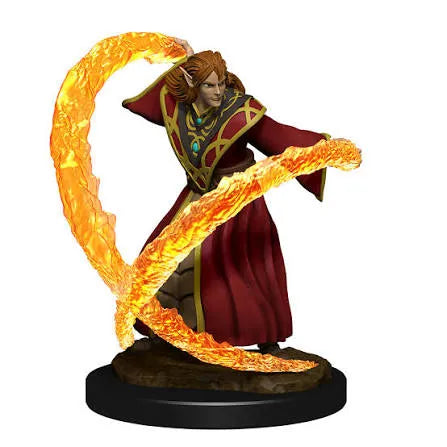 D&D miniatūra: elfu burvis sarkanā tērpā ar caurspīdīgiem, oranžiem maģiskas uguns efektiem uz apaļas pamatnes.