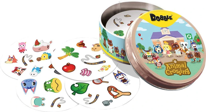 Dobble Animal Crossing galda spēle apaļā metāla kārbā ar krāsainām kārtīm, uz kurām attēloti spēles tēli un priekšmeti.