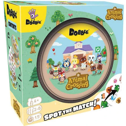 Dobble Animal Crossing kāršu spēle ar krāsainiem tēliem uz apaļām kartiņām zilā un dzeltenā iepakojumā.