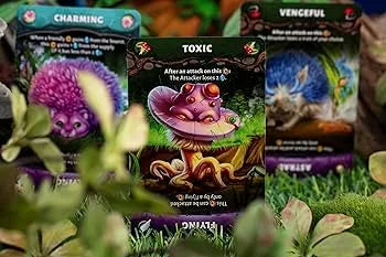 Evolution Another World galda spēles kārtis ar krāsainiem sēņu un dzīvnieku tēliem uz zaļa sūnu fona.