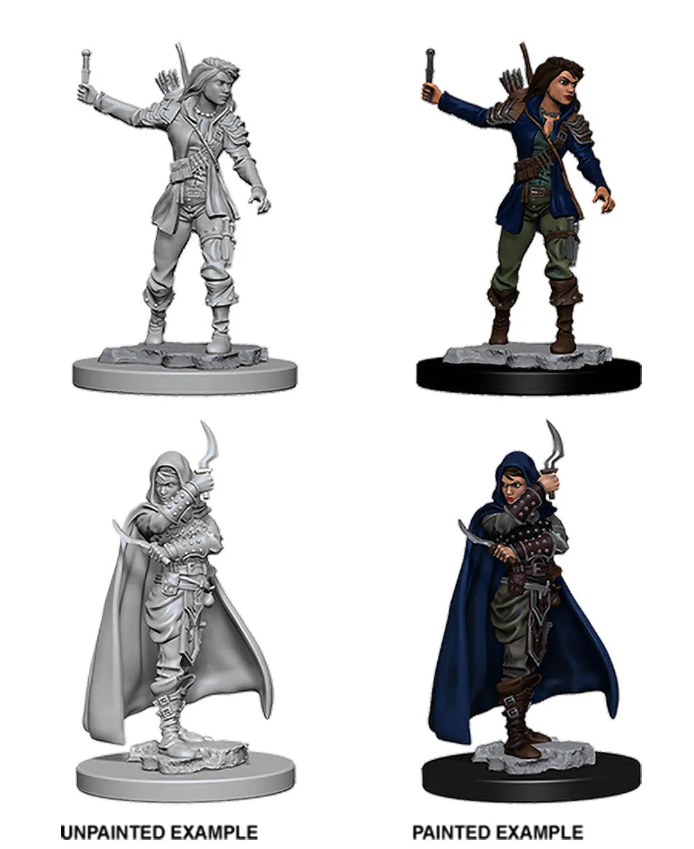 Nekrāsotas un krāsotas Pathfinder miniatūras: sieviete zaglis ar dunčiem un apmetni uz apaļas pamatnes.