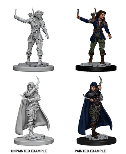 Nekrāsotas un krāsotas Pathfinder miniatūras: sieviete zaglis ar dunčiem un apmetni uz apaļas pamatnes.