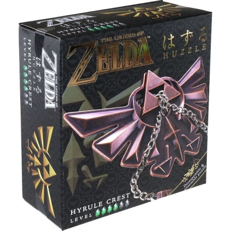 Metāla Huzzle Zelda Hyrule Crest loģikas spēle ar ķēdīti un vara krāsas dizainu uz melna iepakojuma.