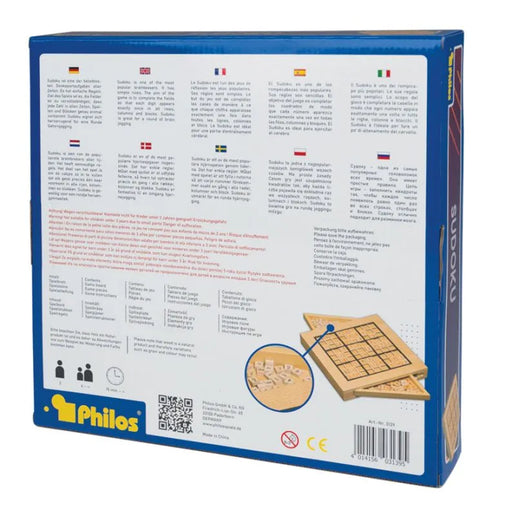 Koka Sudoku spēle zilā iepakojumā ar ciparu čipiem un ērtu uzglabāšanas nodalījumu spēles laukumā.