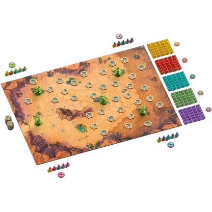Galda spēle Through the Desert ar heksagonālu tuksneša spēles laukumu, krāsainām kamieļu figūriņām un oāžu žetoniem.