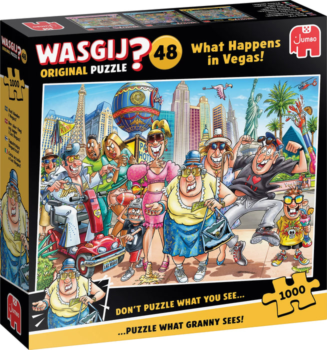 Wasgij Original 48 What Happens in Vegas 1000 gabaliņu puzle ar krāsainu un komisku Lasvegasas tūristu ilustrāciju uz kastes.